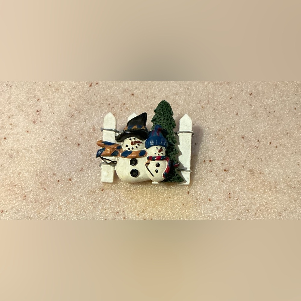 Elegant White and Blue Brooch with Winter Charm